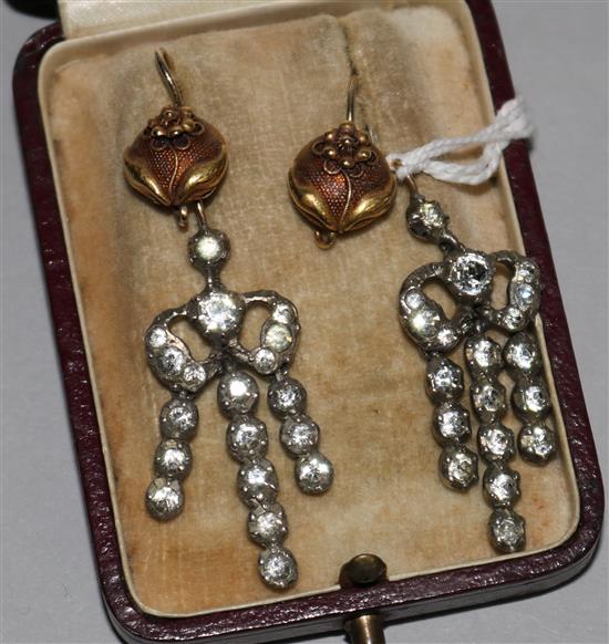 A pair of silver and paste drop earrings and a pair of gold earrings.